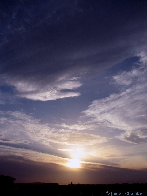 Plenty of cirrus at sunset. Anvil cirrus on the horizon.