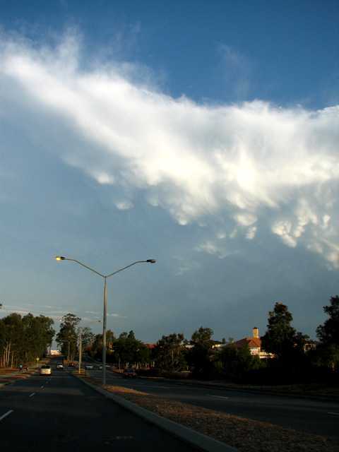 The storm cluster moves north. Mammatus was a feature in the anvil.