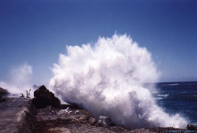 Surf breaking over the Coffs Harbour breakwater