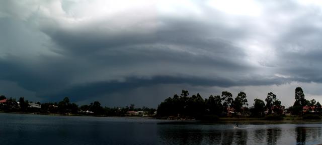 2 photos stithed together - gust front with landing pelican!