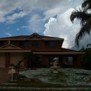 A thunderstorm moves away from the Calamvale area after dropping large amounts of hail. Nov 29, 2005